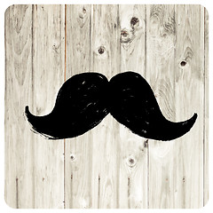 Image showing Moustache symbol on wooden texture.