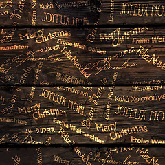 Image showing Christmas Words Pattern On Wooden Texture. Vector