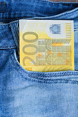 Image showing 200 Euro in a jeans pocket