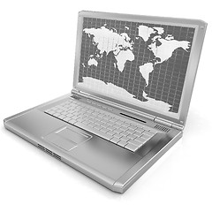 Image showing Gold laptop with world map on screen 