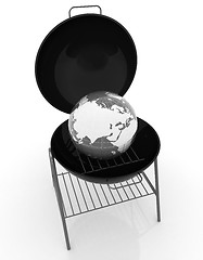 Image showing Oven barbecue grill and earth