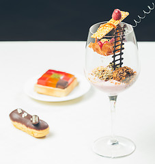 Image showing Close up of chocolate truffles in elegant glasses