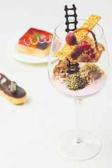 Image showing Close up of chocolate truffles in elegant glasses