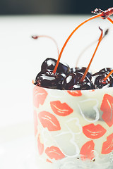 Image showing vanilla dessert with cherry confiture.