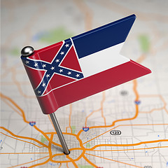 Image showing Mississippi Small Flag on a Map Background.