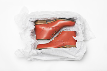 Image showing new red shoes in box