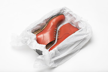 Image showing new red shoes in box