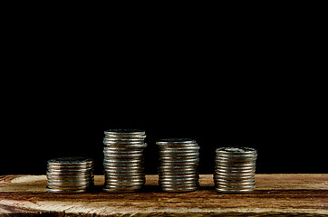 Image showing Piles of silver coins