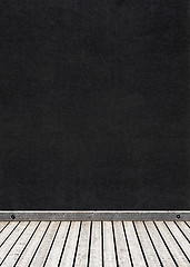 Image showing black wall and wooden floor background 