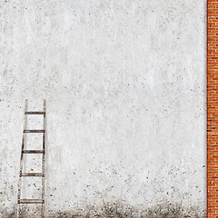 Image showing weathered brick wall with a wooden ladder