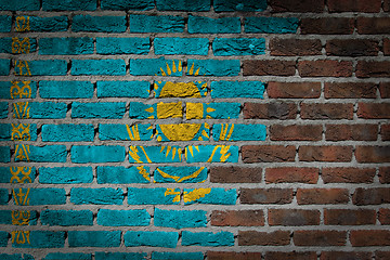 Image showing Brick wall texture with flag