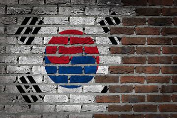 Image showing Brick wall texture with flag