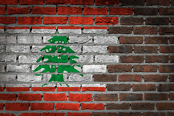 Image showing Brick wall texture with flag