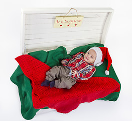 Image showing cute baby boy with a santa claus hat 