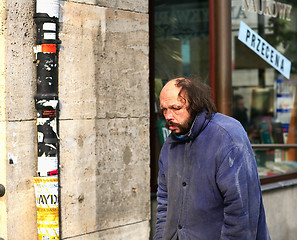 Image showing Sad man walking in the city