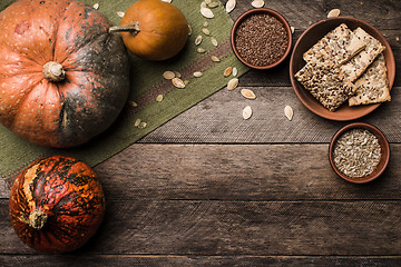 Image showing Cookies with pumkins and seeds on wood