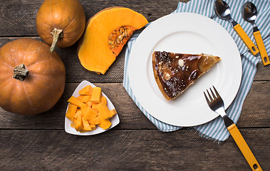 Image showing pumpkins and pie on plate in Rustic style