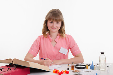 Image showing Friendly pharmacist at your desk