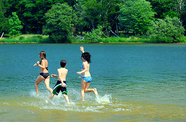 Image showing Children in a lake