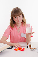 Image showing pharmacist prepared liquid medicine