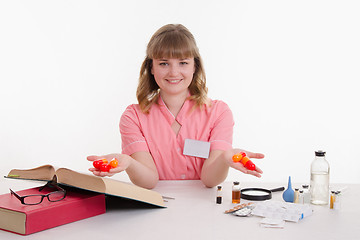 Image showing Pharmacist with pills in hand