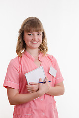 Image showing Portrait of girl in a medical shirt