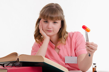 Image showing Tired doctor with pill