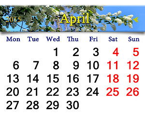 Image showing calendar for April of 2015 year with image of bird cherry tree