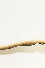 Image showing piece of paper with burned edge