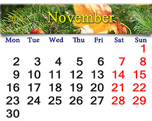 Image showing calendar for November of 2015 with yellow leaf on the spruce