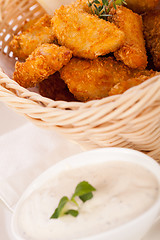 Image showing Crumbed chicken nuggets in a basket