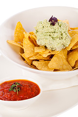 Image showing Crisp corn nachos with guacamole sauce