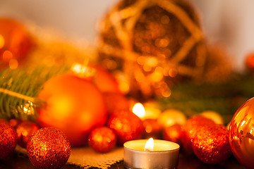 Image showing Warm gold and red Christmas candlelight background