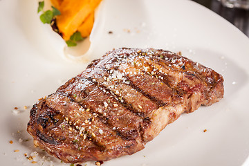 Image showing Grilled beef steak with seasoning