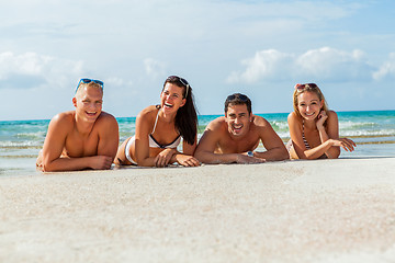 Image showing young happy friends havin fun on the beach