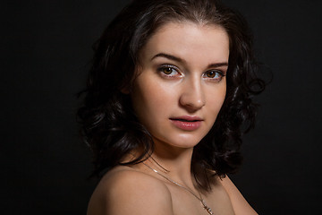 Image showing Dark portrait of a beautiful woman