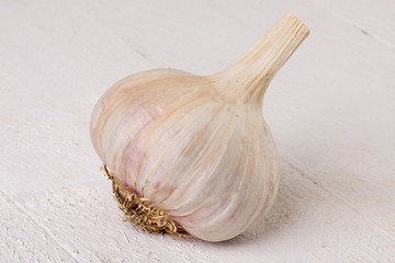 Image showing Fresh garlic bulb with loose cloves