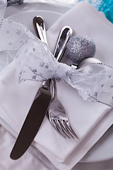 Image showing Stylish blue and silver Christmas table setting