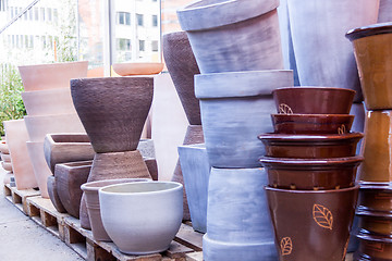 Image showing Glazed and unglazed ceramic flower pots