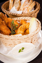 Image showing Crisp crunchy golden chicken legs and wings