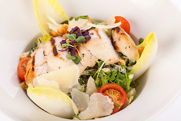 Image showing tasty fresh caesar salad with grilled chicken and parmesan 