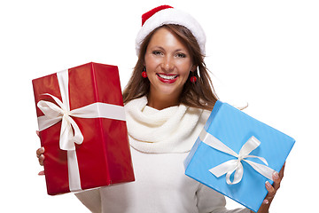 Image showing Vivacious woman in a Santa hat celebrating Xmas