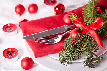 Image showing Red themed Christmas place setting