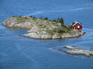 Image showing Small home on island