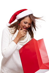 Image showing Happy vivacious Christmas shopper