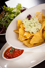 Image showing Crisp corn nachos with guacamole sauce