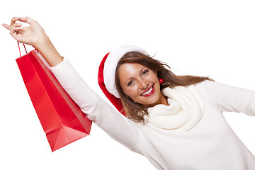 Image showing Happy vivacious Christmas shopper