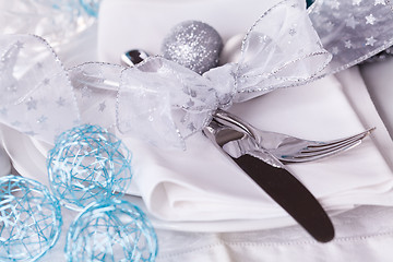 Image showing Stylish blue and silver Christmas table setting