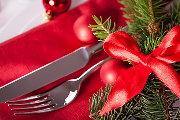 Image showing Red themed Christmas place setting