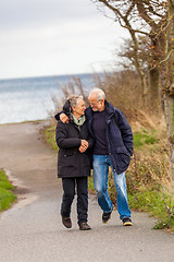 Image showing happy mature couple relaxing baltic sea dunes 